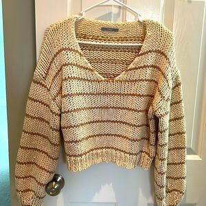 Tart cream and tan striped crop sweater, size M.